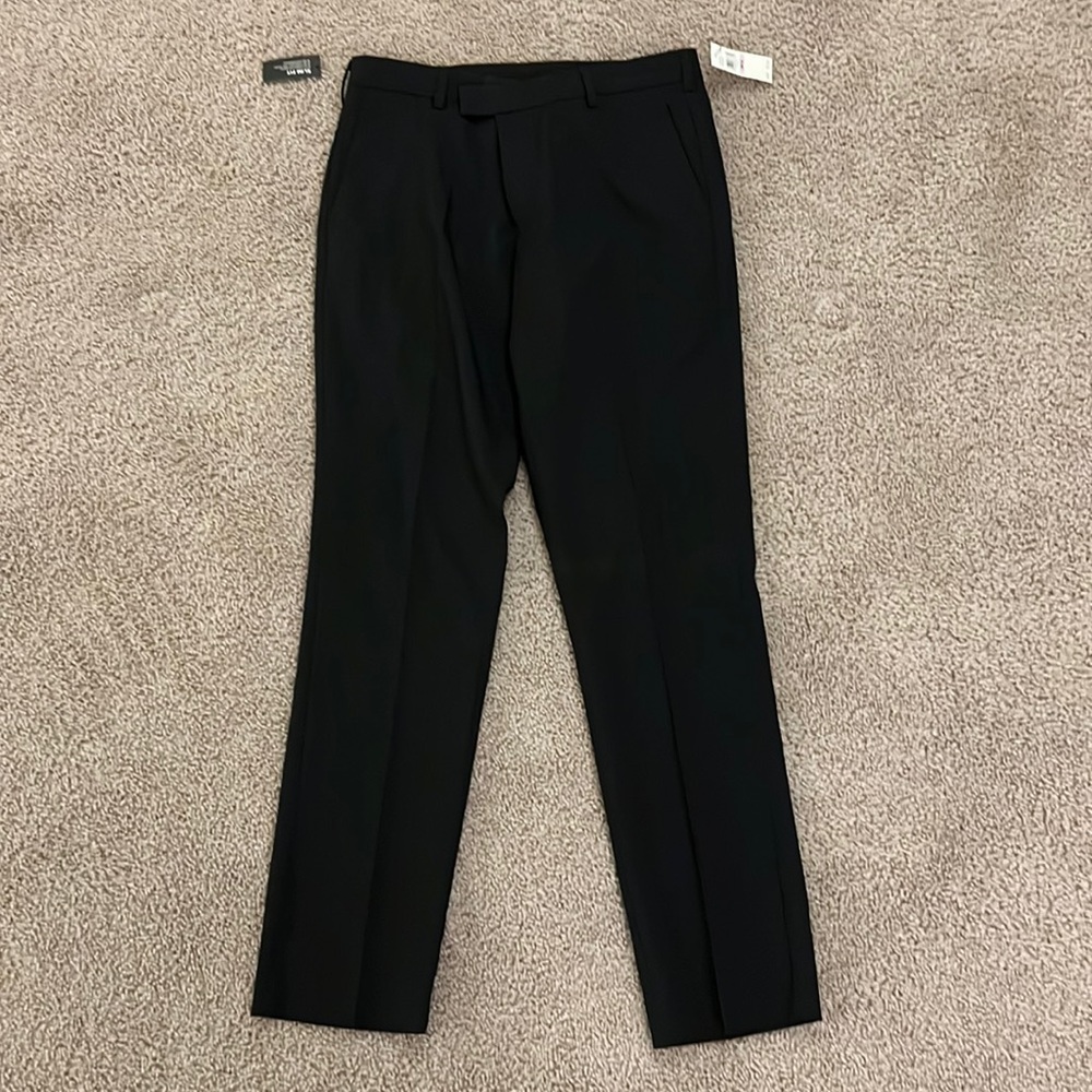Van Heusen Mens black dress slacks. Brand new with tags.